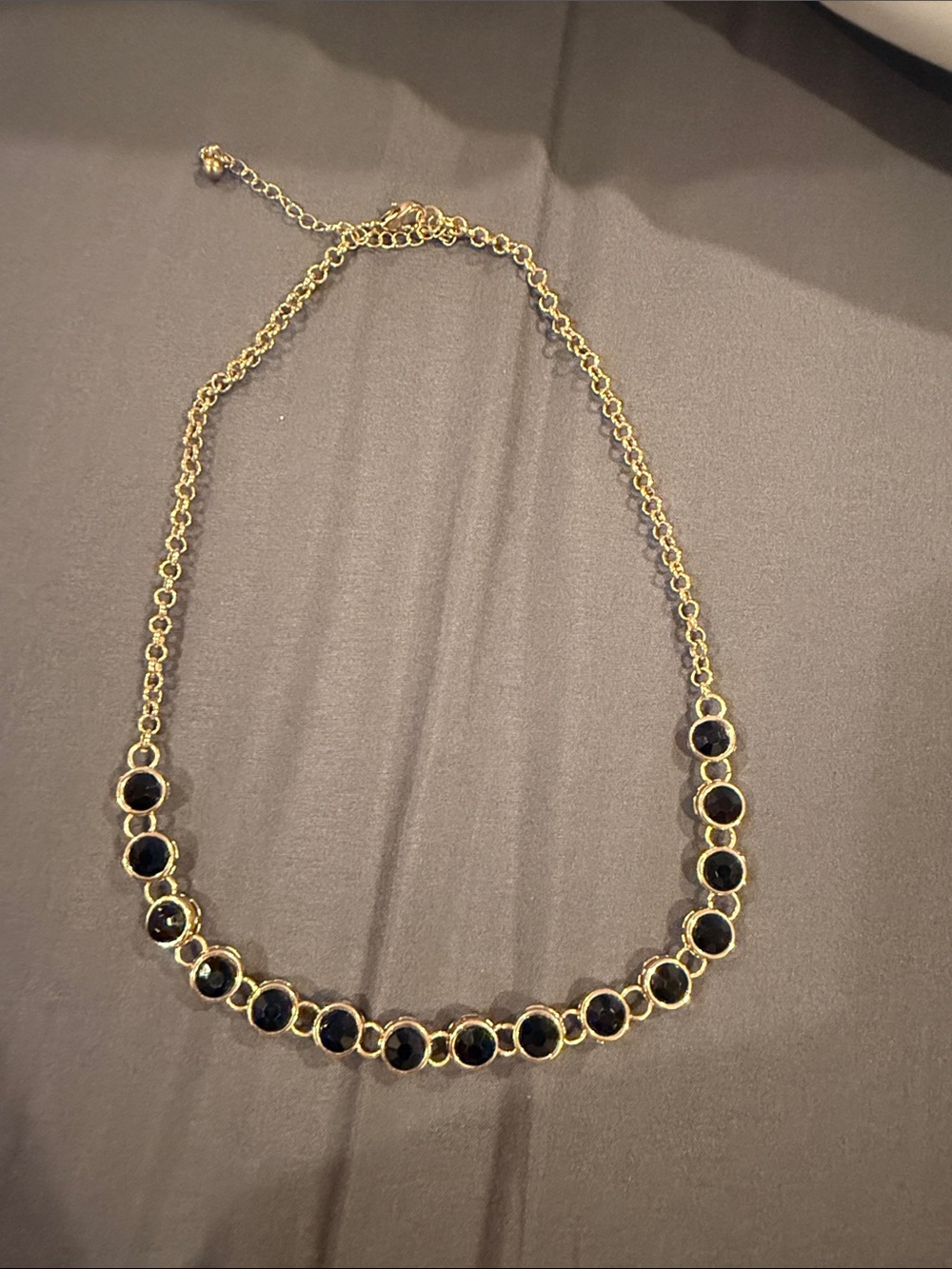 Gold-Tone joker Necklace with Black Stone Accents